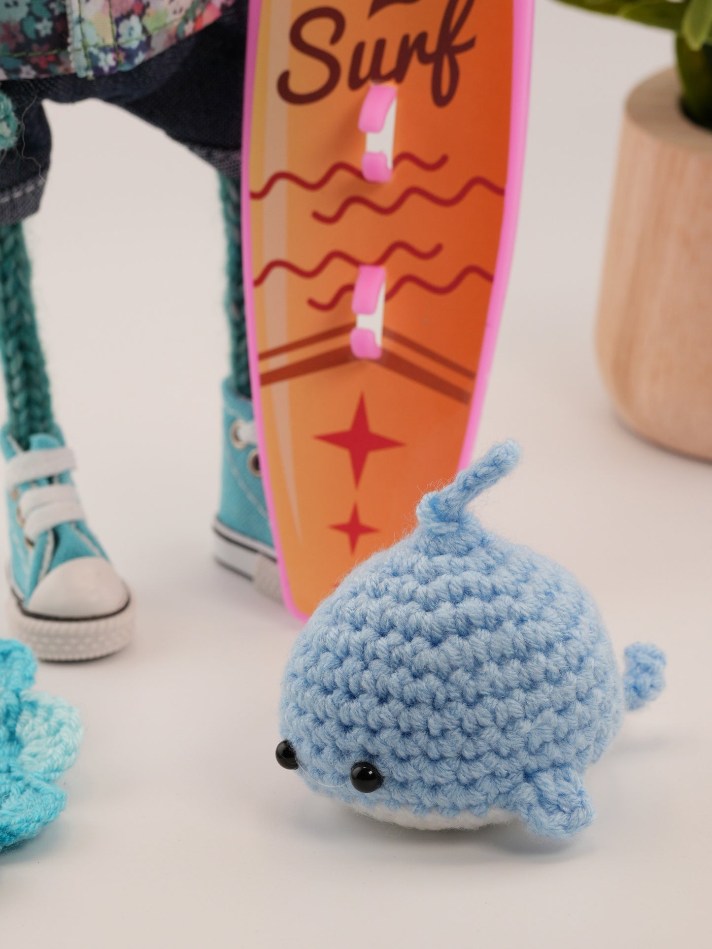 Finnley Bluewave with a tiny whale named Bubbles