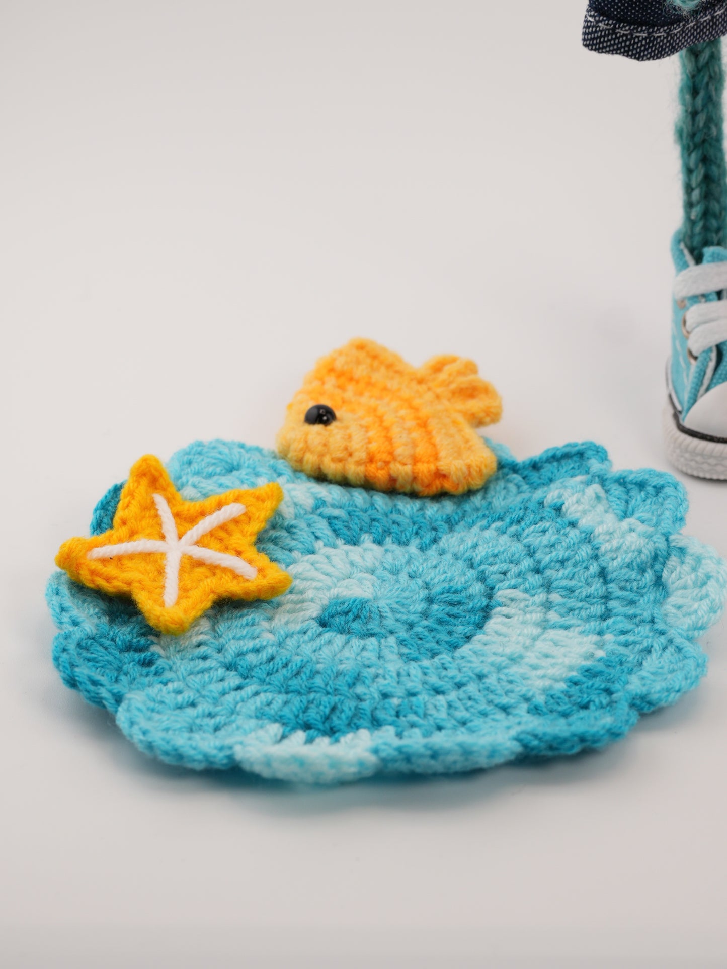Finnley Bluewave with a tiny whale named Bubbles