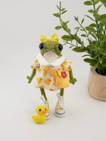 Dottie Quillfoot with a duckling named Crumb