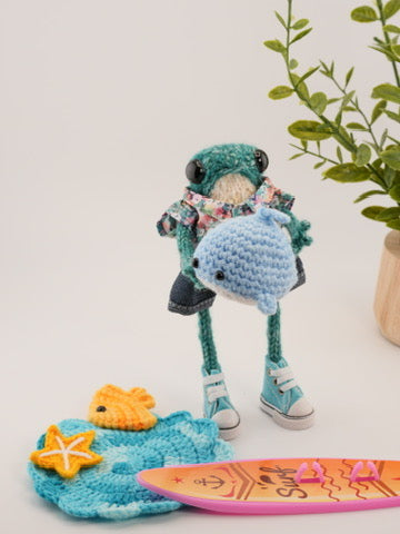 Finnley Bluewave with a tiny whale named Bubbles
