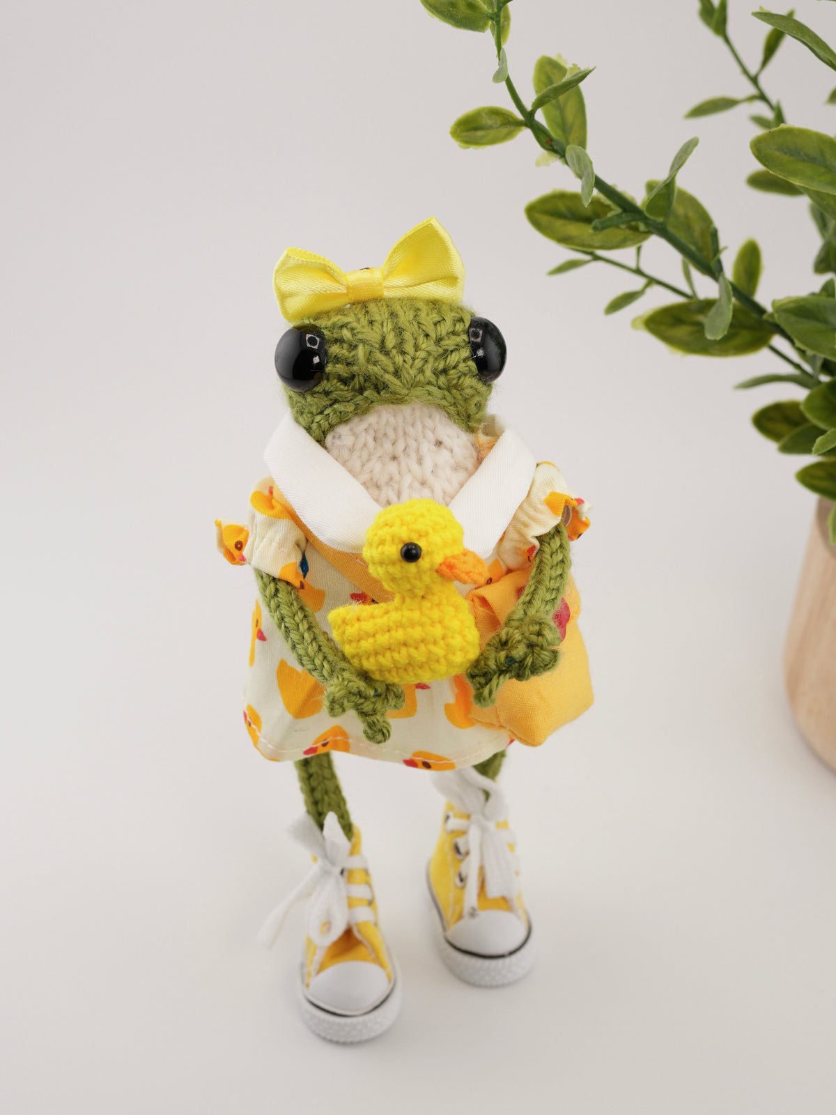 Dottie Quillfoot with a duckling named Crumb