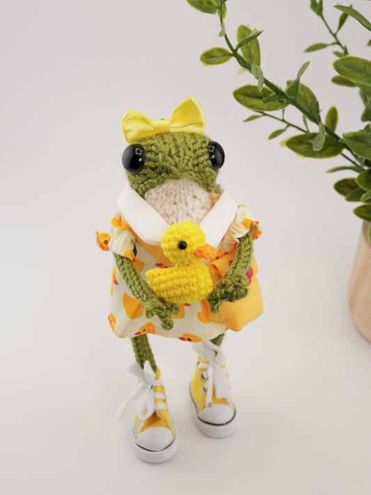 Dottie Quillfoot with a duckling named Crumb